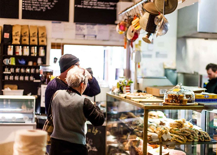 Happy people at the Deli